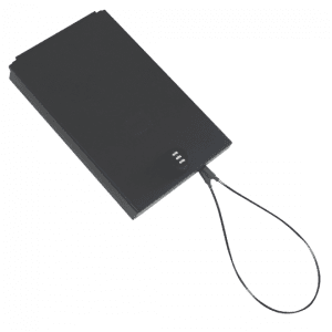 A black Tuffy portable safe with a built-in combination lock and attached steel security cable shown closed on a white background.