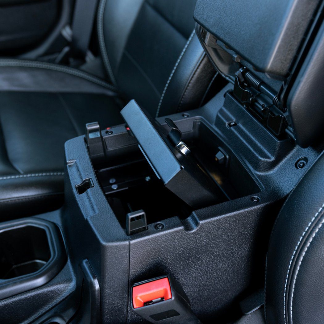 Angled view showing the Tuffy Console Safe lid partially open, displaying the heavy-duty hinge design and smooth lid operation.